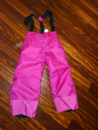 Pantalón de nieve rosa con tirantes niña