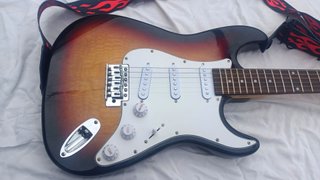 Guitarra Eléctrica con Correa