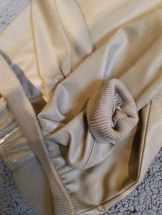 Cazadora Zara efecto piel marrón negociables