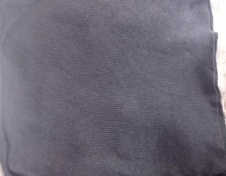 Jersey gris con estrella brillante