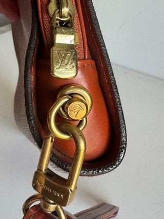 Louis Vuitton clutch Orsay Epi.