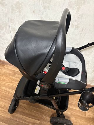 Carro de bebé con silla de coche