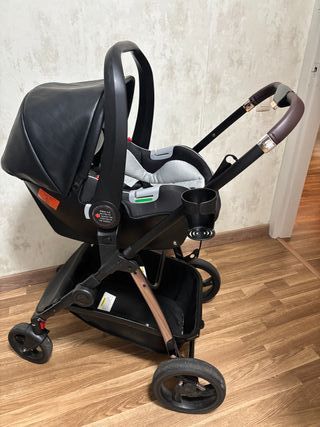 Carro de bebé con silla de coche