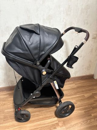 Carro de bebé con silla de coche