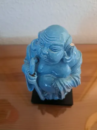 Buda de porcelana vidriada azul