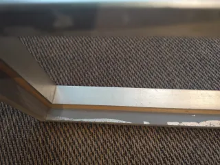 Marco de madera y acabado pan de plata