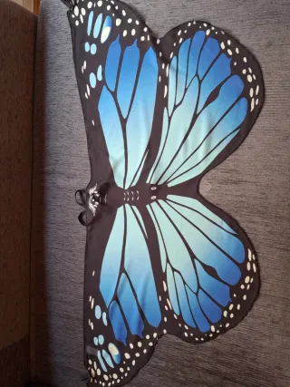 Alas de mariposa azules