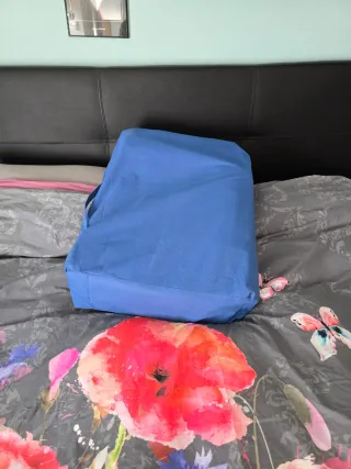 Cojín de lectura azul con luz caliente y masaje