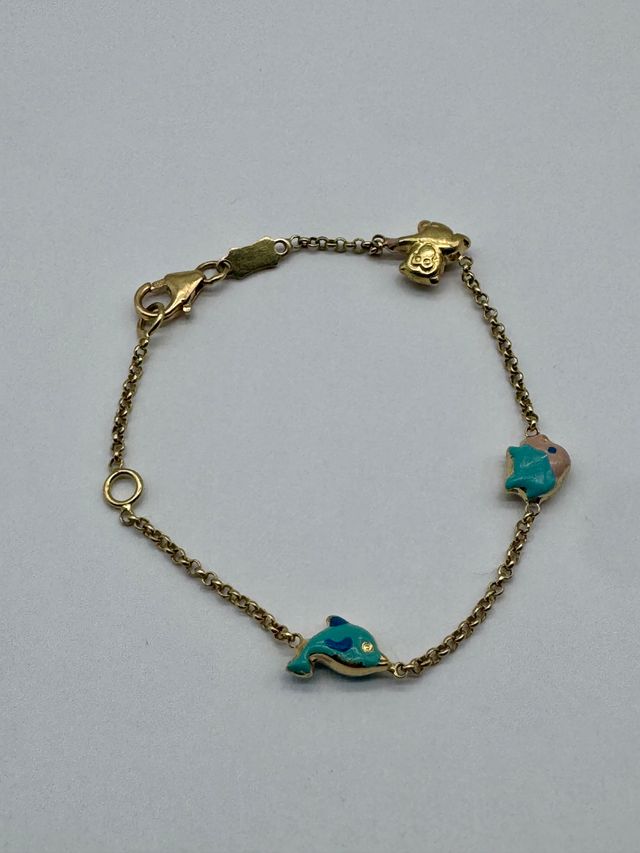 05-0050 PULSERA ORO TIPO ROLO CON ANIMALES