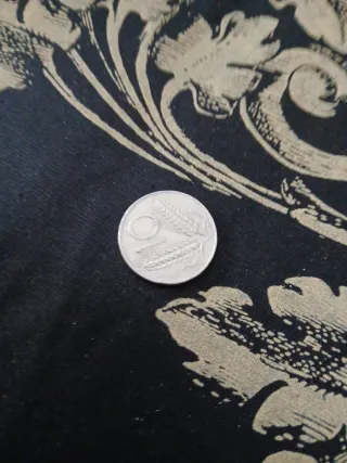 Moneta con spighe di grano