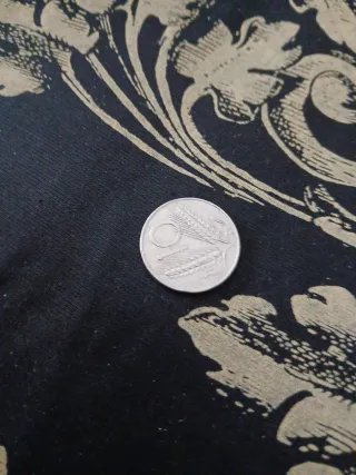 Moneta con spighe di grano