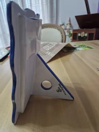 Cornice portafoto in ceramica decorata