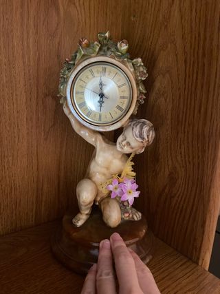 Reloj decorativo figura querubín