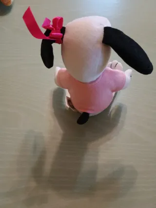 Peluche Snoopy Belle con lazo rosa