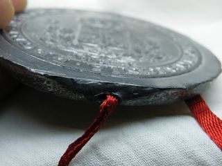 Sello en plomo o Medalla.