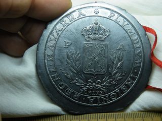 Sello en plomo o Medalla.