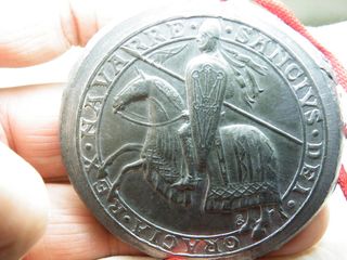 Sello en plomo o Medalla.