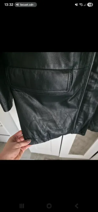 Parka de piel con capucha y pelo