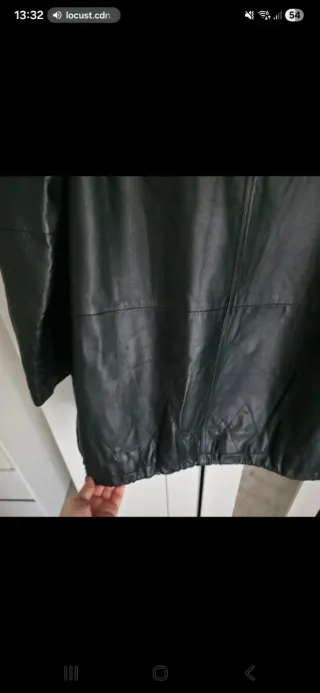 Parka de piel con capucha y pelo