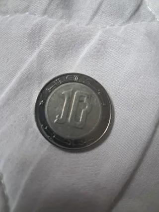 Moneda con león y año 2015