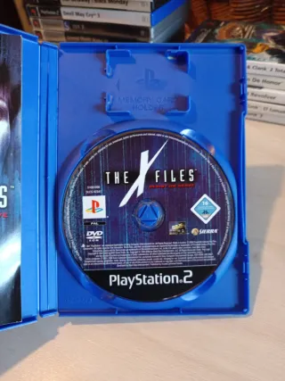 The X Files Resist or Serve PS2 Completo