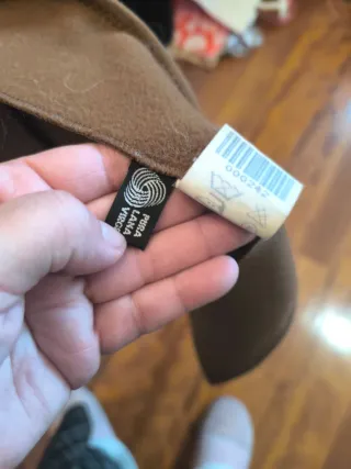 Capa de lana con cuello de pelo