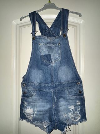 Peto corto vaquero desgastado