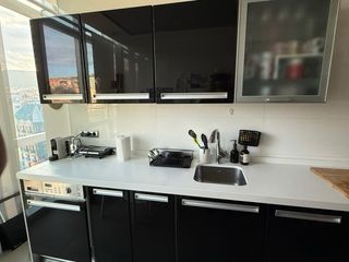 Cocina, frigo combi, campana y placa de inducción