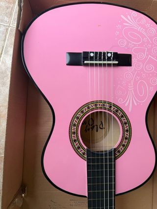 Guitarra infantil rosa con adornos ToysRus