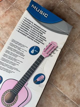 Guitarra infantil rosa con adornos ToysRus