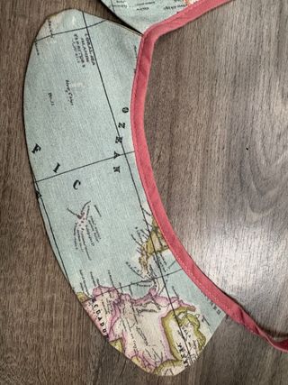 Collar tela mapa mundi cuello