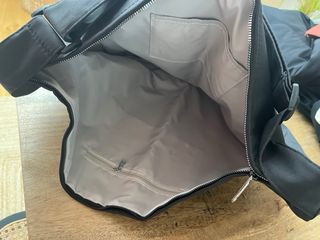 Estrella Galicia. Mochila bandolera negra. Nueva