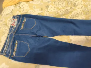 Jeans donna con strass e sfumatura