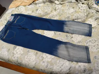 Jeans donna con strass e sfumatura