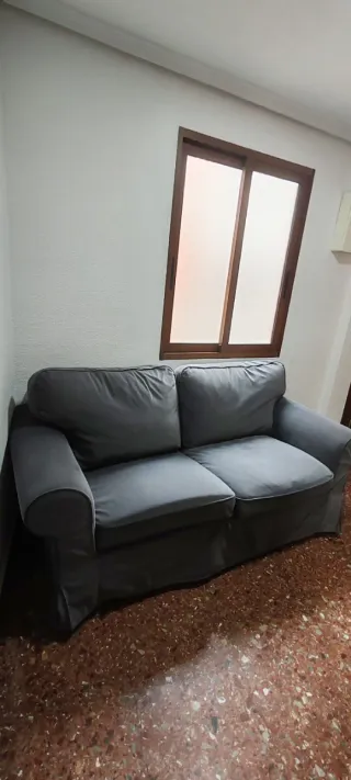 Sofá gris de tela como nuevo