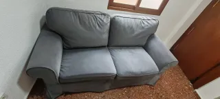 Sofá gris de tela como nuevo