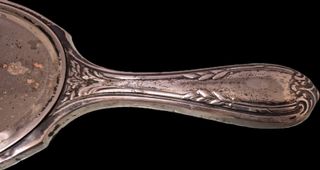 Specchio ovale d'argento