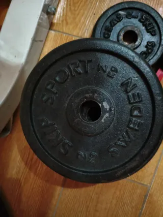 Discos de pesas color negro 20kg y 10kg