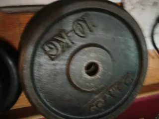 Discos de pesas color negro 20kg y 10kg