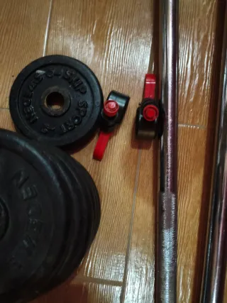 Discos de pesas color negro 20kg y 10kg