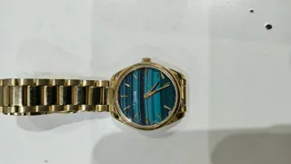 Reloj CLUSE dorado con esfera verde