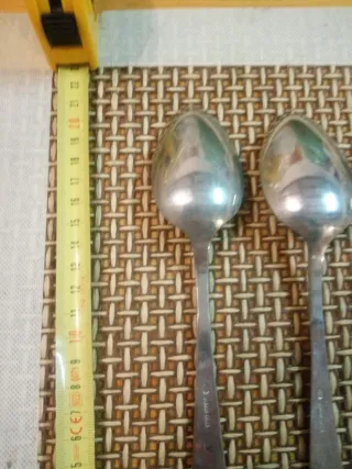 Juego 6 Cucharas  alpaca y  5 Tenedores plata.