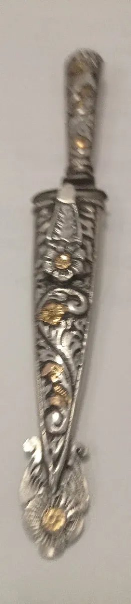 Una pieza Plata de ley y oro pric.S XX,sello