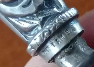 Una pieza Plata de ley y oro pric.S XX,sello