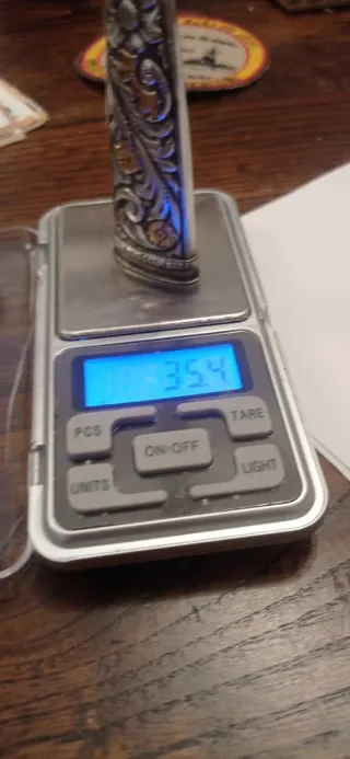 Una pieza Plata de ley y oro pric.S XX,sello