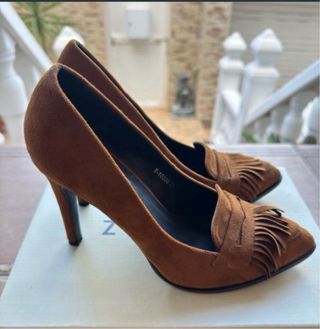 Lote de zapatos variados.