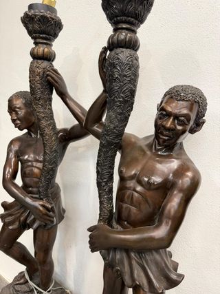 Pareja de bronces hombres africanos,