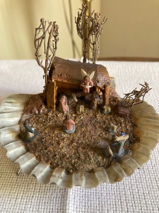 Belén en concha figuras barro