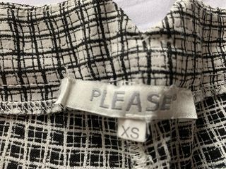 Pantaloni a quadri bianchi e neri