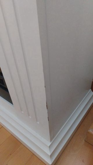 Chimenea eléctrica con mueble blanco